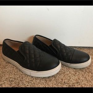 Black Steve Madden slides